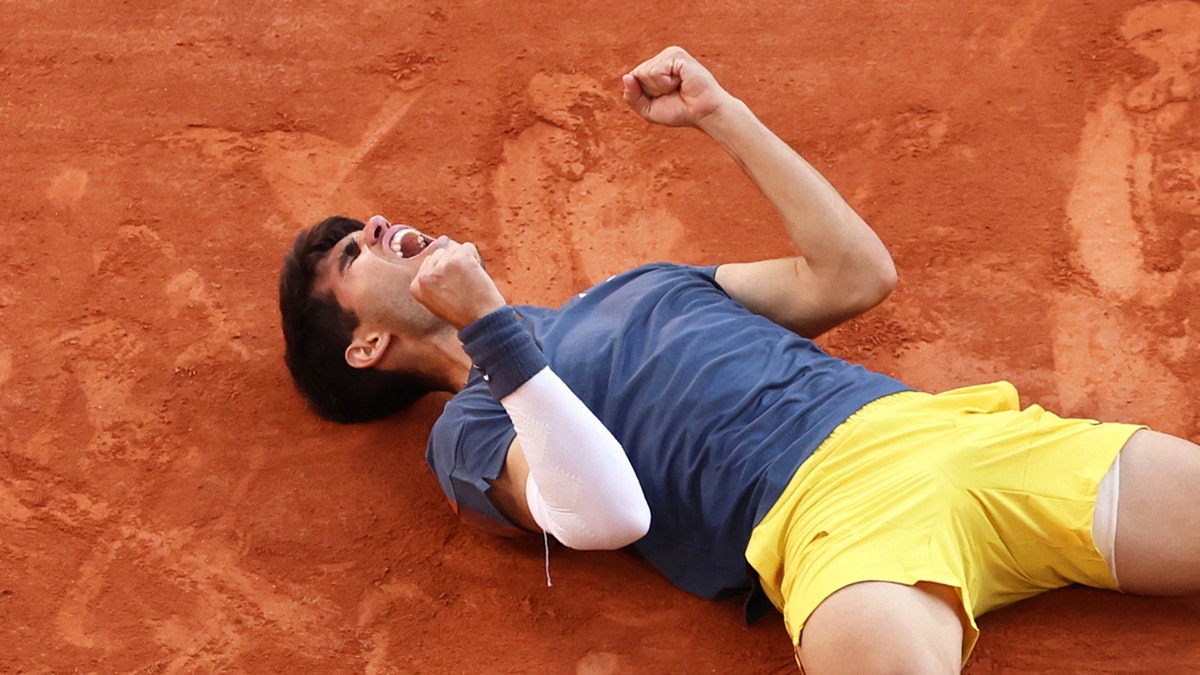 Carlos Alcaraz celebrates a win