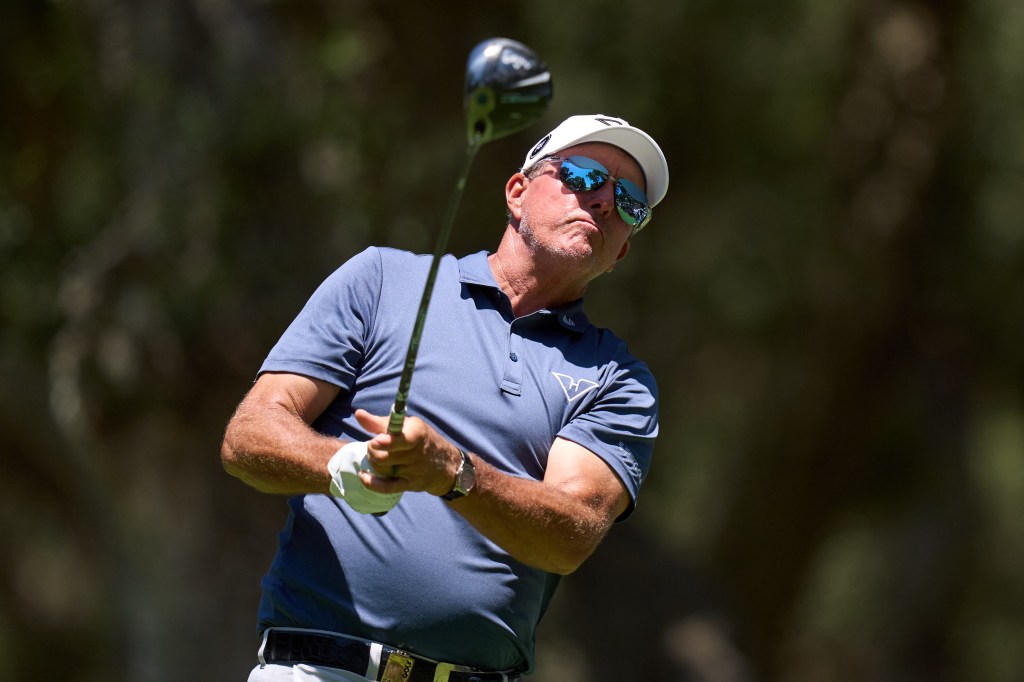 Phil Mickelson of HyFlyers GC tees off on the ninth hole during day two of the LIV Golf Andalucia at Real Club Valderrama on July 13, 2024 in Sotogrande, Spain. 