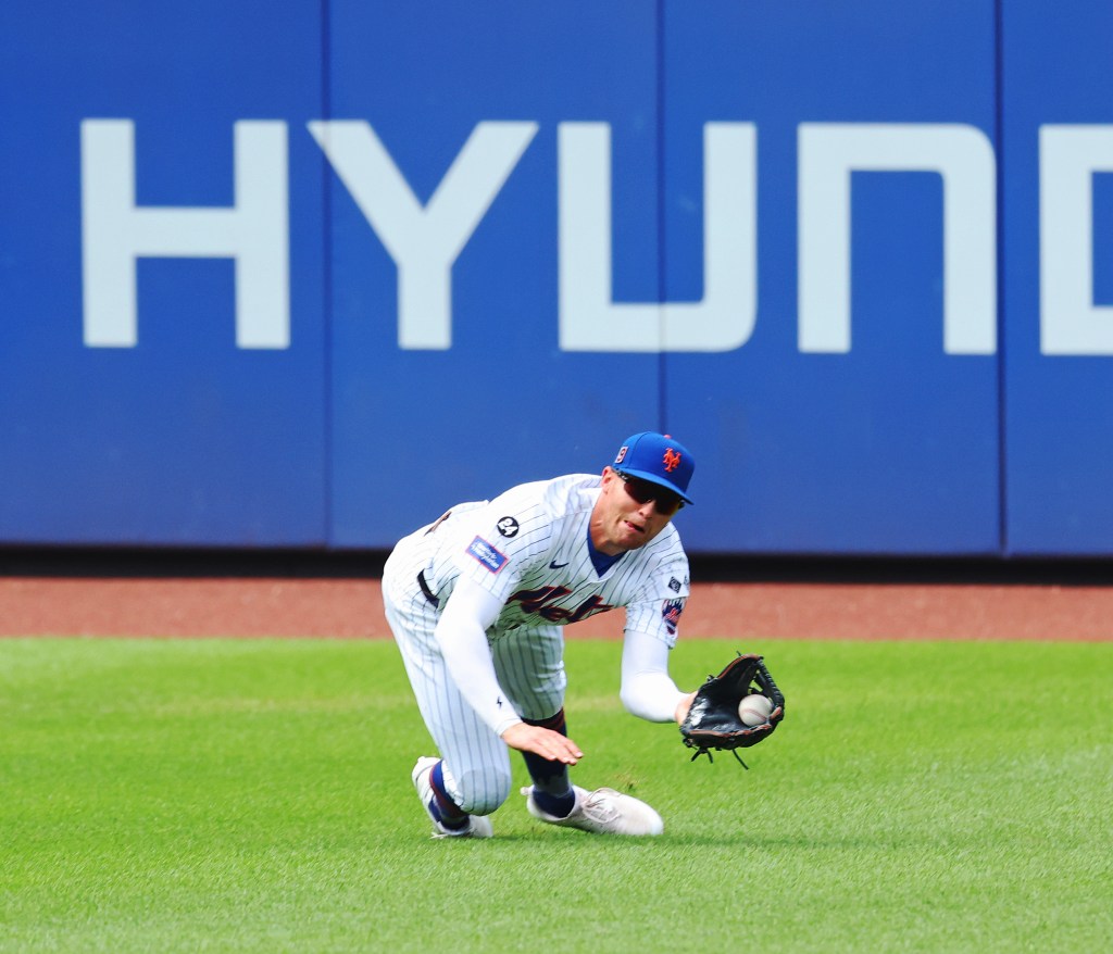 Mets outfielder Brandon Nimmo (9) makes a stellar catch on a drive to shallow left by Miami Marlins catcher Nick Fortes.