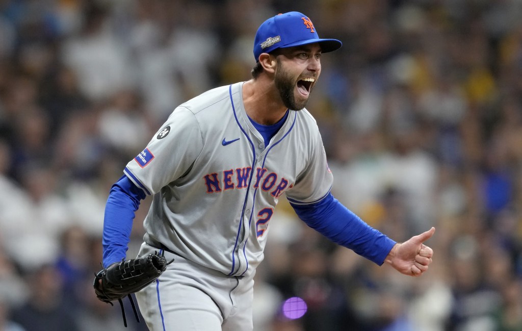 David Peterson celebrates after picking up his first career save to close out the Mets' 4-2 NL Wild Card-clinching win over the Brewers on Oct. 3, 2024.