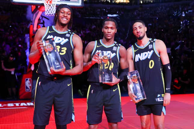 INDIANAPOLIS, INDIANA - FEBRUARY 17: Myles Turner #33, Bennedict Mathurin #00 and Tyrese Haliburton #0 of the Indiana Pacers pose for a photo after winning the 2024 Kia Skills Challenge during the State Farm All-Star Saturday Night at Lucas Oil Stadium on February 17, 2024 in Indianapolis, Indiana. NOTE TO USER: User expressly acknowledges and agrees that, by downloading and or using this photograph, User is consenting to the terms and conditions of the Getty Images License Agreement. (Photo by Stacy Revere/Getty Images)