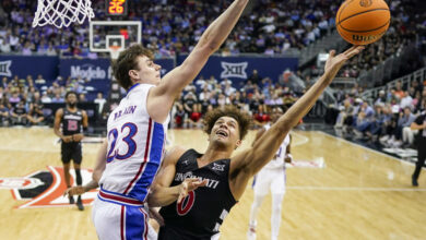 Dan Skillings and Cincinnati knocked off Kansas to reach the quarterfinals of the Big 12 tournament on Wednesday night.