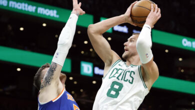 Boston Celtics center Kristaps Porzingis leads a team that is a heavy favorite to win the Eastern Conference. (Photo by Danielle Parhizkaran/The Boston Globe via Getty Images)