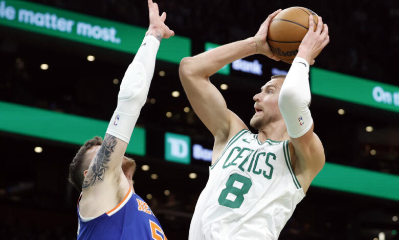 Boston Celtics center Kristaps Porzingis leads a team that is a heavy favorite to win the Eastern Conference. (Photo by Danielle Parhizkaran/The Boston Globe via Getty Images)