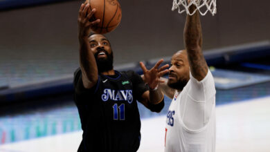 Kyrie Irving and the Maverick's broke Friday's Game 6 open in the second half. (Ron Jenkins/Getty Images)