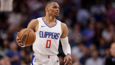 DALLAS, TEXAS - APRIL 28: Russell Westbrook #0 of the Los Angeles Clippers brings the ball up court in the second half of game four of the Western Conference First Round Playoffs against the Dallas Mavericks at American Airlines Center on April 28, 2024 in Dallas, Texas.  NOTE TO USER: User expressly acknowledges and agrees that, by downloading and or using this photograph, User is consenting to the terms and conditions of the Getty Images License Agreement. (Photo by Tim Warner/Getty Images)