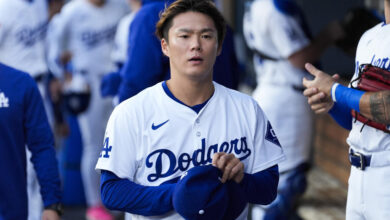 Yoshinobu Yamamoto is slated to undergo further testing after leaving Saturday's game after two innings. (AP Photo/Ashley Landis)