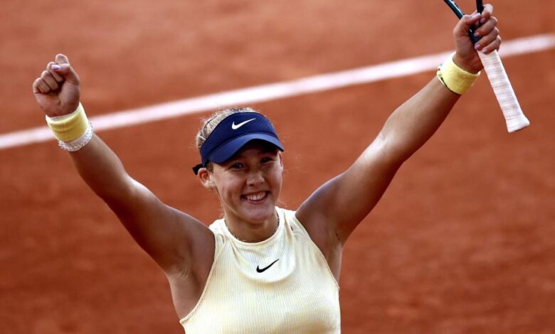 Mirra Andreeva celebrates reaching the French Open semi-final with a win over Aryna Sabalenka