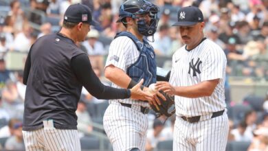 Aaron Boone takes Nestor Cortes out of the game during the fifth inning of the Yankees' 9-1 loss to the Rays.