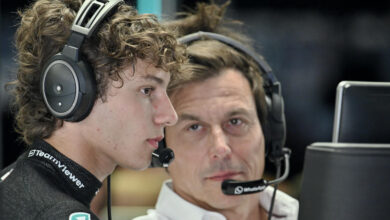 MONZA, ITALY - AUGUST 30: Andrea Kimi Antonelli of Italy and Mercedes-AMG PETRONAS F1 Team and Toto Wolff of Austria and Mercedes-AMG PETRONAS F1 Team in the garage during practice ahead of the F1 Grand Prix of Italy at Autodromo Nazionale Monza on August 30, 2024 in Monza, Italy. (Photo by Vince Mignott/MB Media/Getty Images)