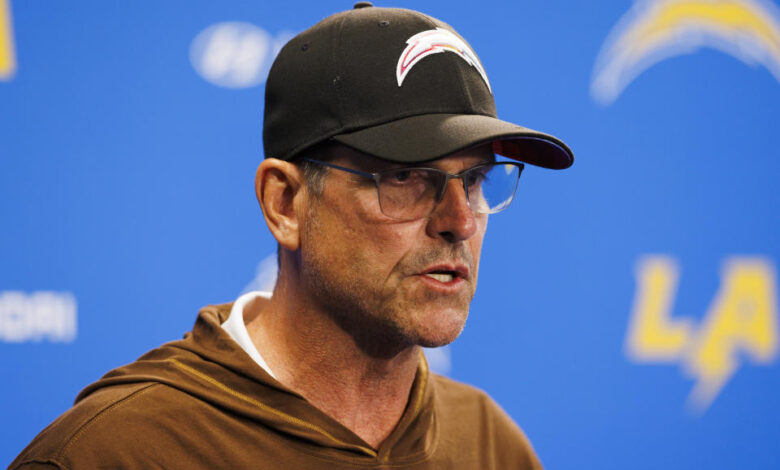 COSTA MESA, CALIFORNIA - JUNE 13: Jim Harbaugh of the Los Angeles Chargers at the podium before an NFL football practice at Hoag Performance Center on June 13, 2024 in Costa Mesa, California. (Photo by Ric Tapia/Getty Images)