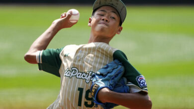 Taiwan's Lai Cheng-Xi delivers during the first inning of the International Championship baseball game against Venezuela at the Little League World Series tournament in South Williamsport, Pa., Saturday, Aug. 24, 2024. (AP Photo/Gene J. Puskar)