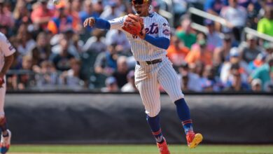 New York Mets shortstop Francisco Lindor (12) throws the ball to first base for an out during the sixth inning against the Baltimore Orioles at Citi Field.