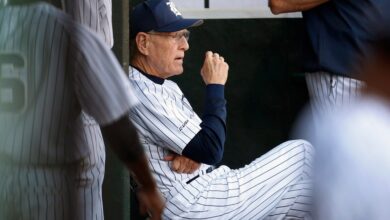 Rice coach Wayne Graham, who died at the age of 88 on Tuesday, sits in the dugout during a game against Texas A&M in Houston on April 5, 2016.