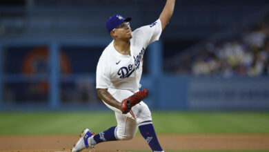 LOS ANGELES, CALIFORNIA - SEPTEMBER 01:  Julio Urias #7 of the Los Angeles Dodgers throws against the Atlanta Braves in the first inning at Dodger Stadium on September 01, 2023 in Los Angeles, California. (Photo by Ronald Martinez/Getty Images)