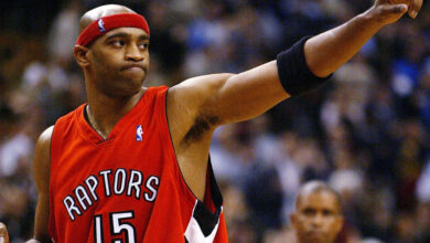 TORONTO - NOVEMBER 3:   Vince Carter #15 of the Toronto Raptors salutes the crowd after beating the Houston Rockets 95-88 during a game at the Air Canada Centre on November 3, 2003 in Toronto, Canada.  NOTE TO USER: User expressly acknowledges and agrees that, by downloading and or using this photograph, User is consenting to the terms and conditions of the Getty Images License Agreement. (Photo by Dave Sandford/Getty Images)