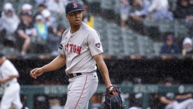 Bryan Bello #66 of the Boston Red Sox returns to the dugout after the final out of the fourth inning against the Chicago White Sox at Guaranteed Rate Field on June 08, 2024 in Chicago, Illinois.