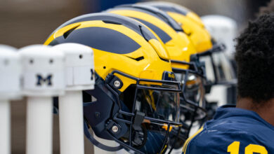 ANN ARBOR, MICHIGAN - APRIL 20: Michigan Football helmets displayed behind the Blue Team bench during the Michigan Football Spring Game at Michigan Stadium on April 20, 2024 in Ann Arbor, Michigan. (Photo by Jaime Crawford/Getty Images)