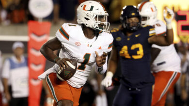 Miami quarterback Cam Ward (1) runs against California during the first half of an NCAA college football game in Berkeley, Calif., Saturday, Oct. 5, 2024. (AP Photo/Jed Jacobsohn)