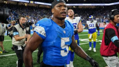 Detroit Lions running back David Montgomery (5) celebrates his game winning touchdown against Los Angeles Rams in overtime at Ford Field in Detroit on Sunday, September 8, 2024.