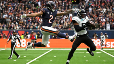 LONDON, ENGLAND - OCTOBER 13: Andre Cisco of Jacksonville Jaguars is challenged by DJ Moore of Chicago Bears during the NFL match between Jacksonville Jaguars and Chicago Bears at Tottenham Hotspur Stadium on October 13, 2024 in London, England. (Photo by Harry Murphy/Getty Images)