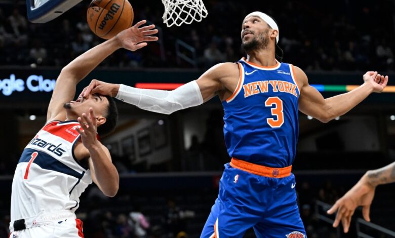 Josh Hart hits Johnny Davis in the face after blocking his shot in the Knicks' 118-117 preseason loss to the Wizards on Oct. 18, 2024.