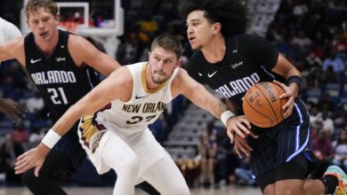 Matt Ryan (left) defends a driving Anthony Black during the Pelicans' 106-104 preseason win over the Magic.