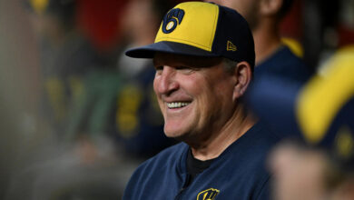 PHOENIX, ARIZONA - SEPTEMBER 13: Manager Pat Murphy #21 of the Milwaukee Brewers looks on from the dugout against the Arizona Diamondbacks at Chase Field on September 13, 2024 in Phoenix, Arizona. (Photo by Norm Hall/Getty Images)