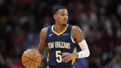 New Orleans Pelicans guard Dejounte Murray (5) dribbles against the Houston Rockets during the second half of an NBA preseason basketball game Tuesday, Oct. 15, 2024, in Houston. (AP Photo/Eric Christian Smith)