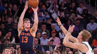 Tyler Kolek shoots over AJ Green during the Knicks win over the Bucks.