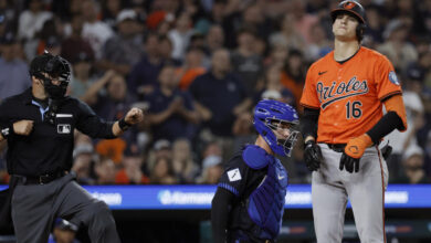 DETROIT, MI -  SEPTEMBER 13:  Coby Mayo #16 of the Baltimore Orioles reacts after being called out on strikes by home plate umpire Will Little n(L) with catcher Dillon Dingler #38 of the Detroit Tigers behind the plate in the ninth inning at Comerica Park on September 13, 2024 in Detroit, Michigan. (Photo by Duane Burleson/Getty Images)