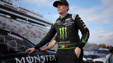 MARTINSVILLE, VIRGINIA - NOVEMBER 01: Riley Herbst, driver of the #98 Monster Energy Ford, walks the grid during qualifying for the NASCAR Xfinity Series National Debt Relief 250 at Martinsville Speedway on November 01, 2024 in Martinsville, Virginia. (Photo by Jonathan Bachman/Getty Images)