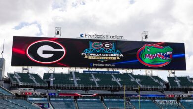 Police, fans get into wild melees at Florida-Georgia game as 1 fan allegedly uses racial slur, death threat