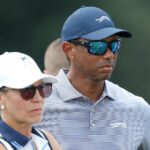 BLOOMFIELD HILLS, MICHIGAN - JULY 23: Tiger Woods of the United States stands near the putting green on day two of the 76th U.S. Junior Amateur Championship on the South Course at Oakland Hills Country Club on July 23, 2024 in Bloomfield Hills, Michigan. (Photo by Raj Mehta/Getty Images)