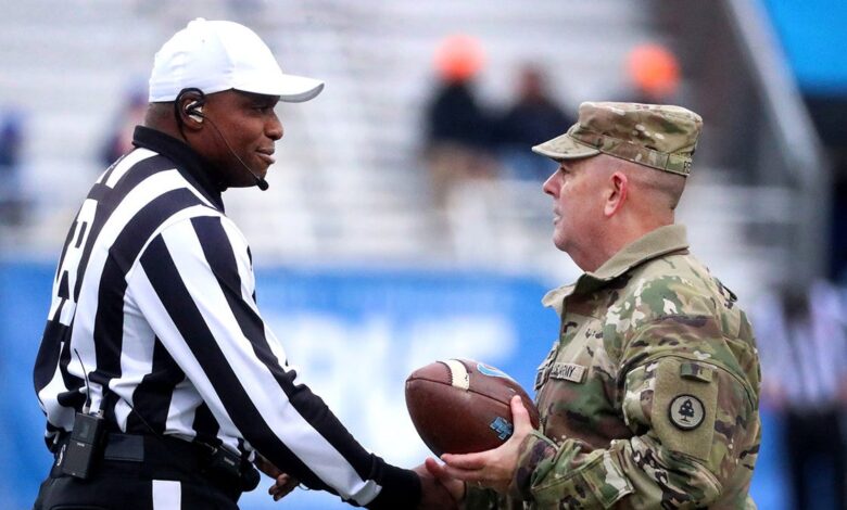 College football referee interrupts penalty call to salute military veterans during Celebration Bowl