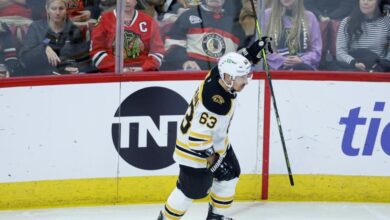 Boston Bruins captain Brad Marchand celebrates after scoring against the Chicago Blackhawks after his pre-game exchange with the NHL on TNT panel on Wednesday.<p>Kamil Krzaczynski-Imagn Images</p>