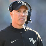 SOUTH BEND, INDIANA - NOVEMBER 18: Head coach Dave Clawson of the Wake Forest Demon Deacons  looks on in the first half against the Notre Dame Fighting Irish at Notre Dame Stadium on November 18, 2023 in South Bend, Indiana. (Photo by Quinn Harris/Getty Images)